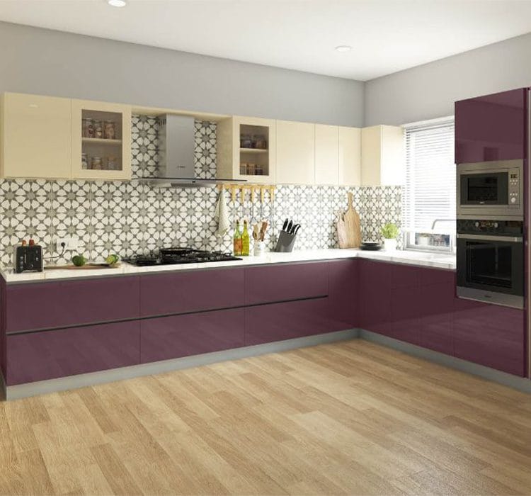 L-shape modular kitchen 5 Modern l-shaped modular kitchen featuring a stylish combination of deep purple lower cabinets and beige upper cabinets with glass doors. The space is enhanced with a white marble countertop and a patterned tile backsplash. A built-in oven and microwave are neatly integrated, while a large window allows natural light to brighten the kitchen. The wooden flooring adds warmth to the overall design.