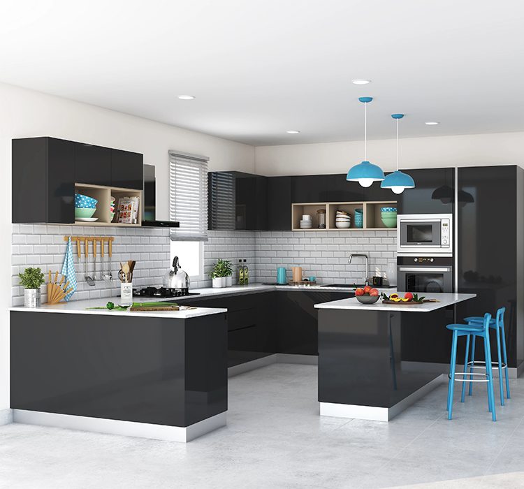 Island shape modular kitchen 5 Alea modular kitchen's modern island shaped kitchen with peninsula featuring sleek black cabinets, white countertops, and subway tile backsplash. Bright blue pendant lights and bar stools add vibrant accents. Open display shelving, built-in appliances, and spacious cooking area highlight contemporary modular design.