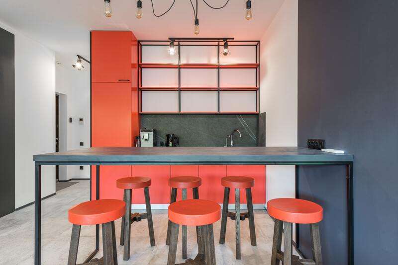 Top 5 factors affecting cost of modular kitchen 1 Grey and red combo modular kitchen
